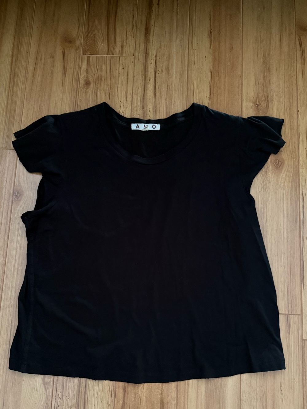 AMO Ruffle Sleeve Tee in Black